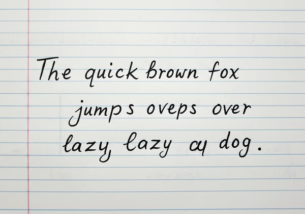 一张手写的草书句子在横线纸上